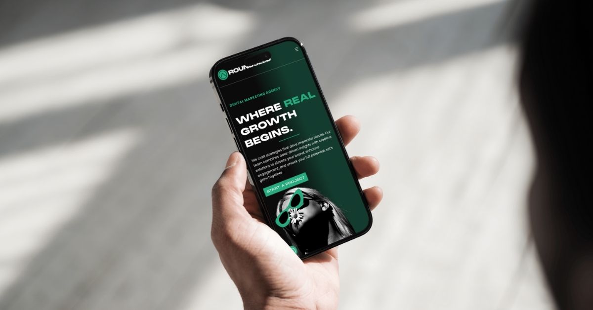 Person looking at a responsive website on their mobile phone