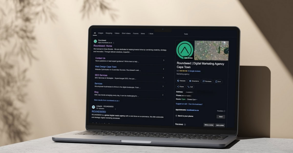 A laptop with a Google Business Profile on it which is essential for local SEO